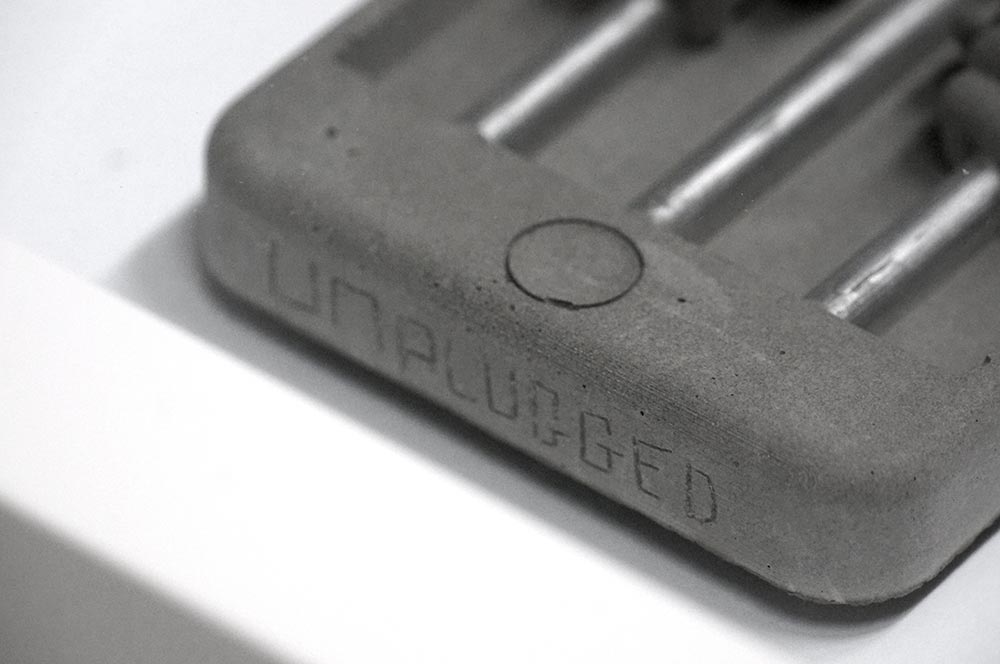 Unplugged: "Concrete Cell Phone" - Silver - Concrete Art